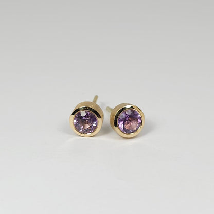 Colored solitaire earrings