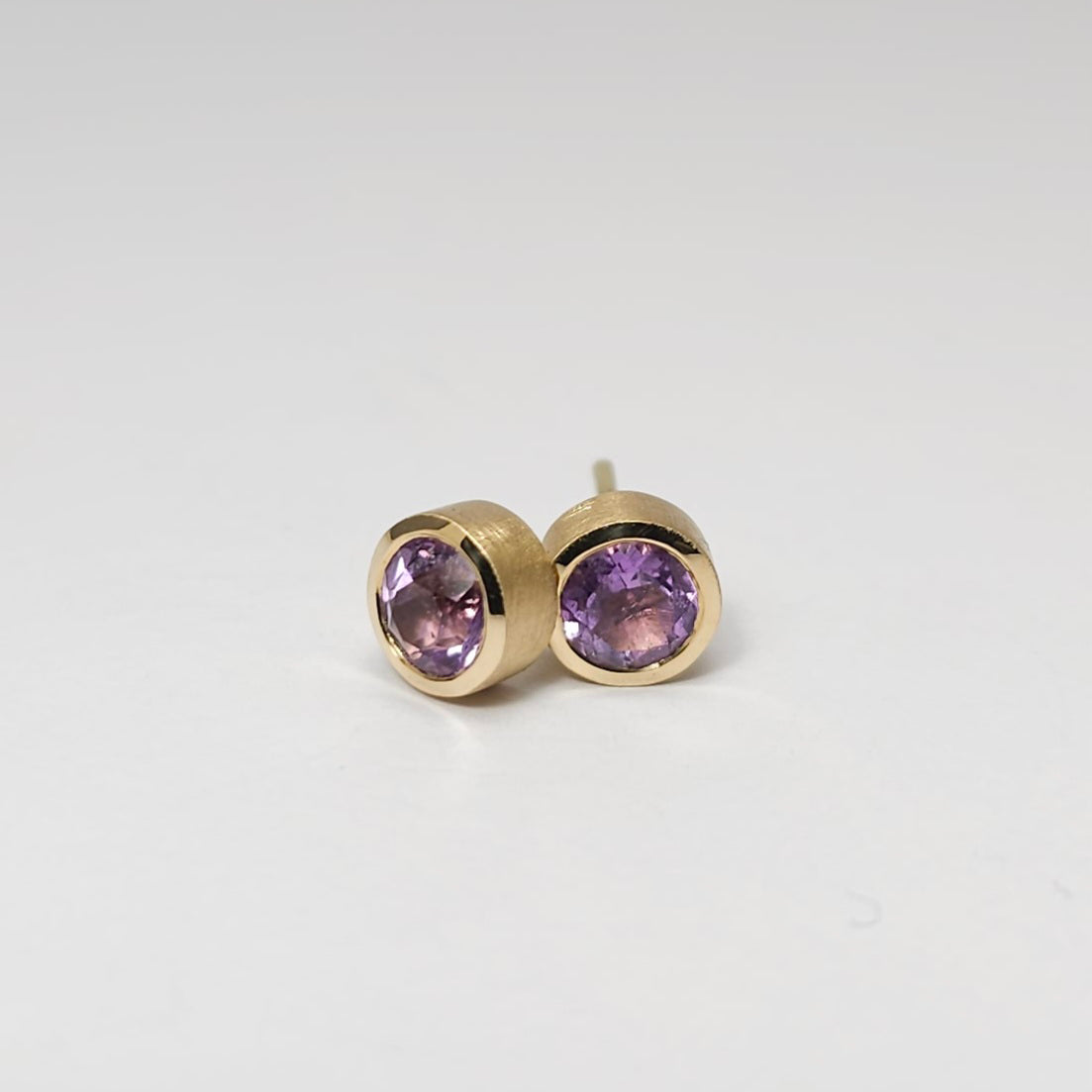 Colored solitaire earrings