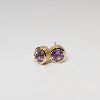 Colored solitaire earrings