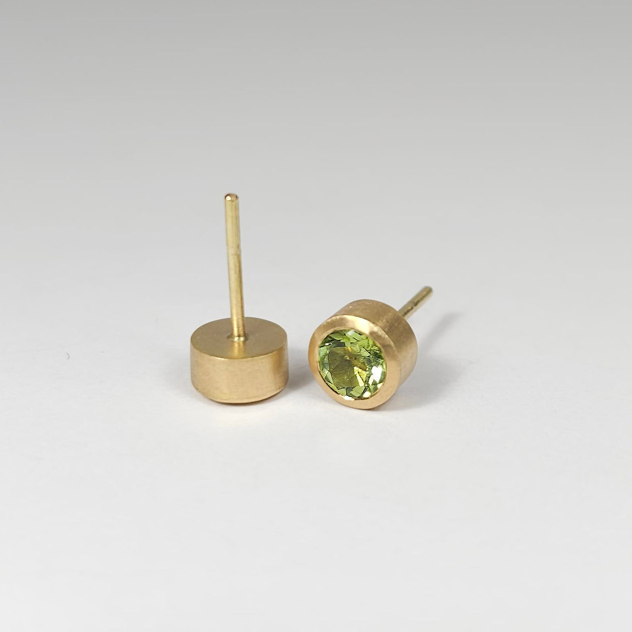 Colored solitaire earrings
