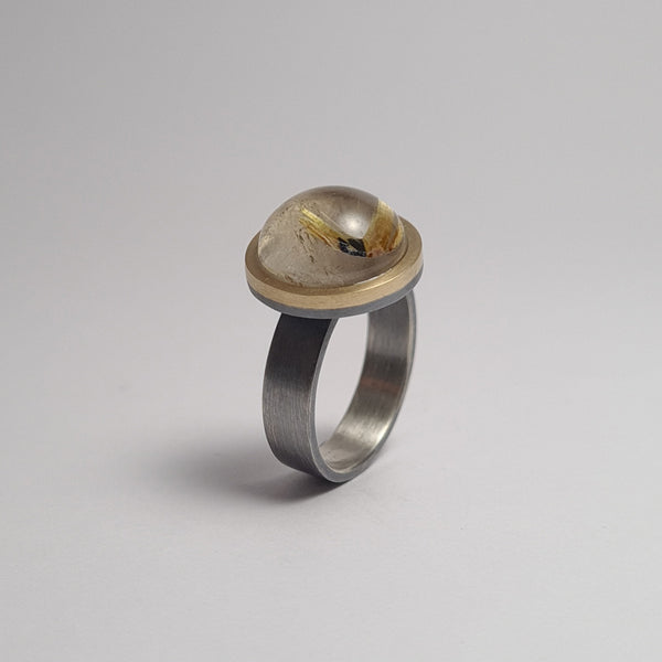 Quartz ring with rutile.