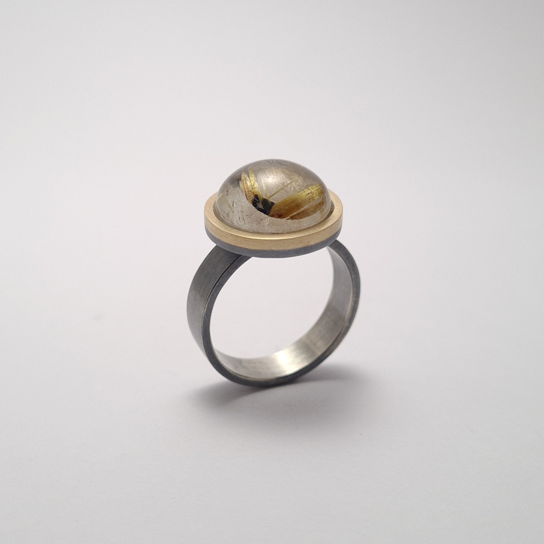 Quartz ring with rutile.