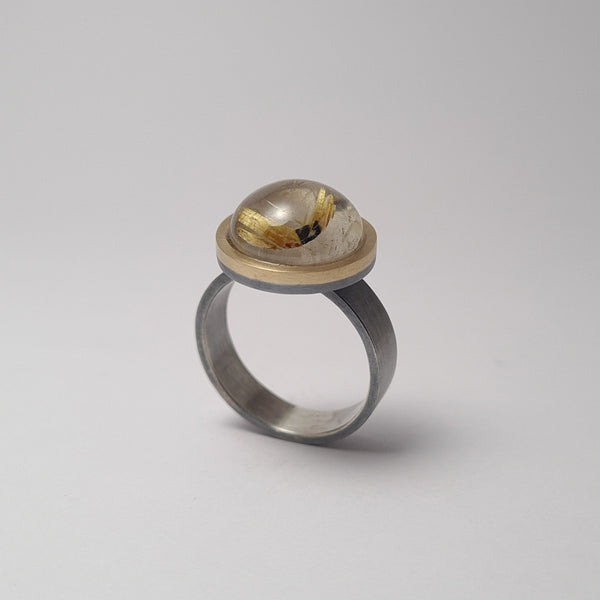 Quartz ring with rutile.