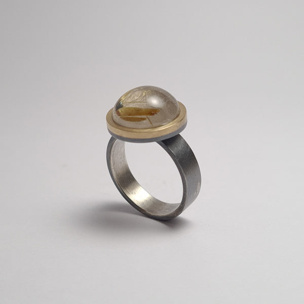 Quartz ring with rutile.