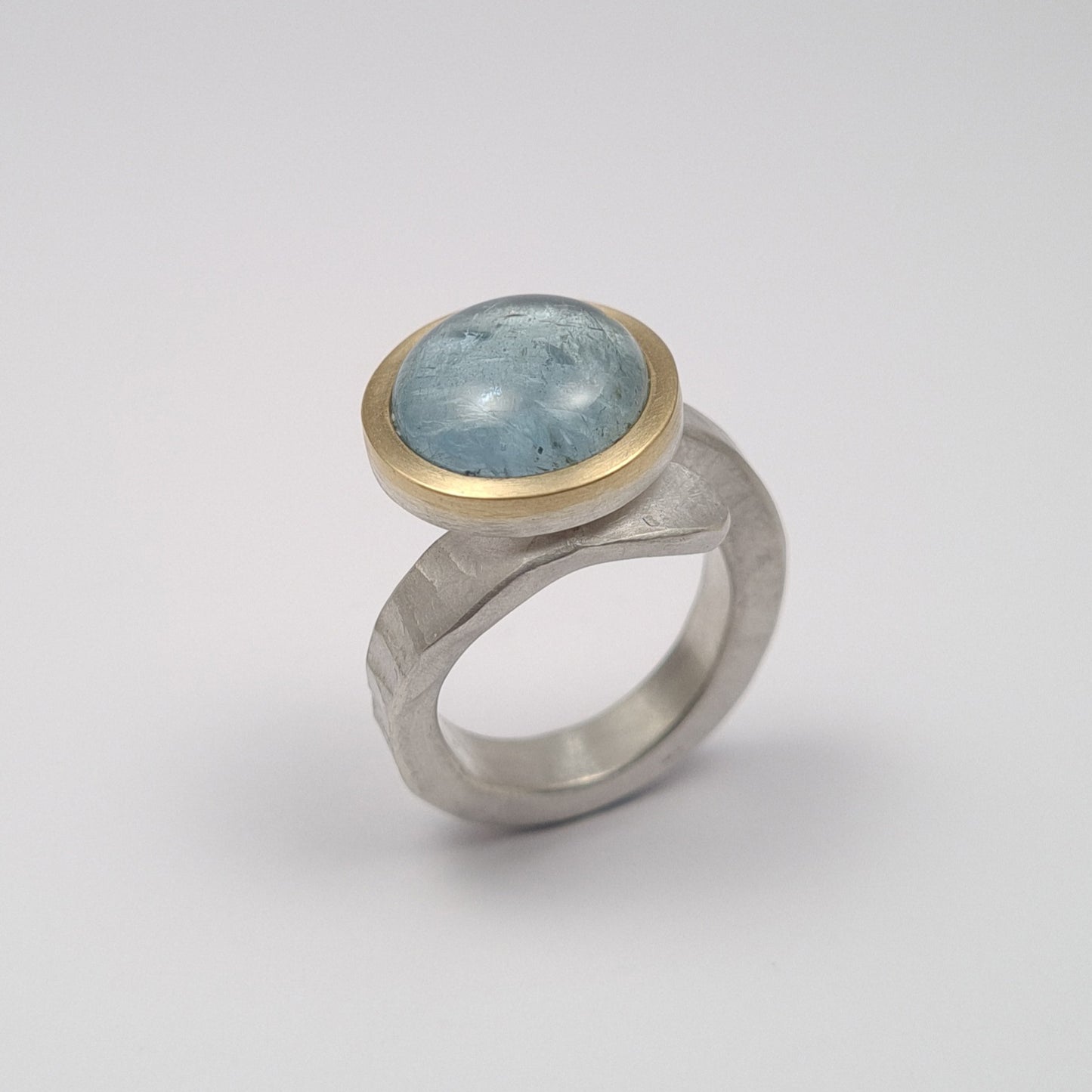 ForJa ring crossed with aquamarine. YES