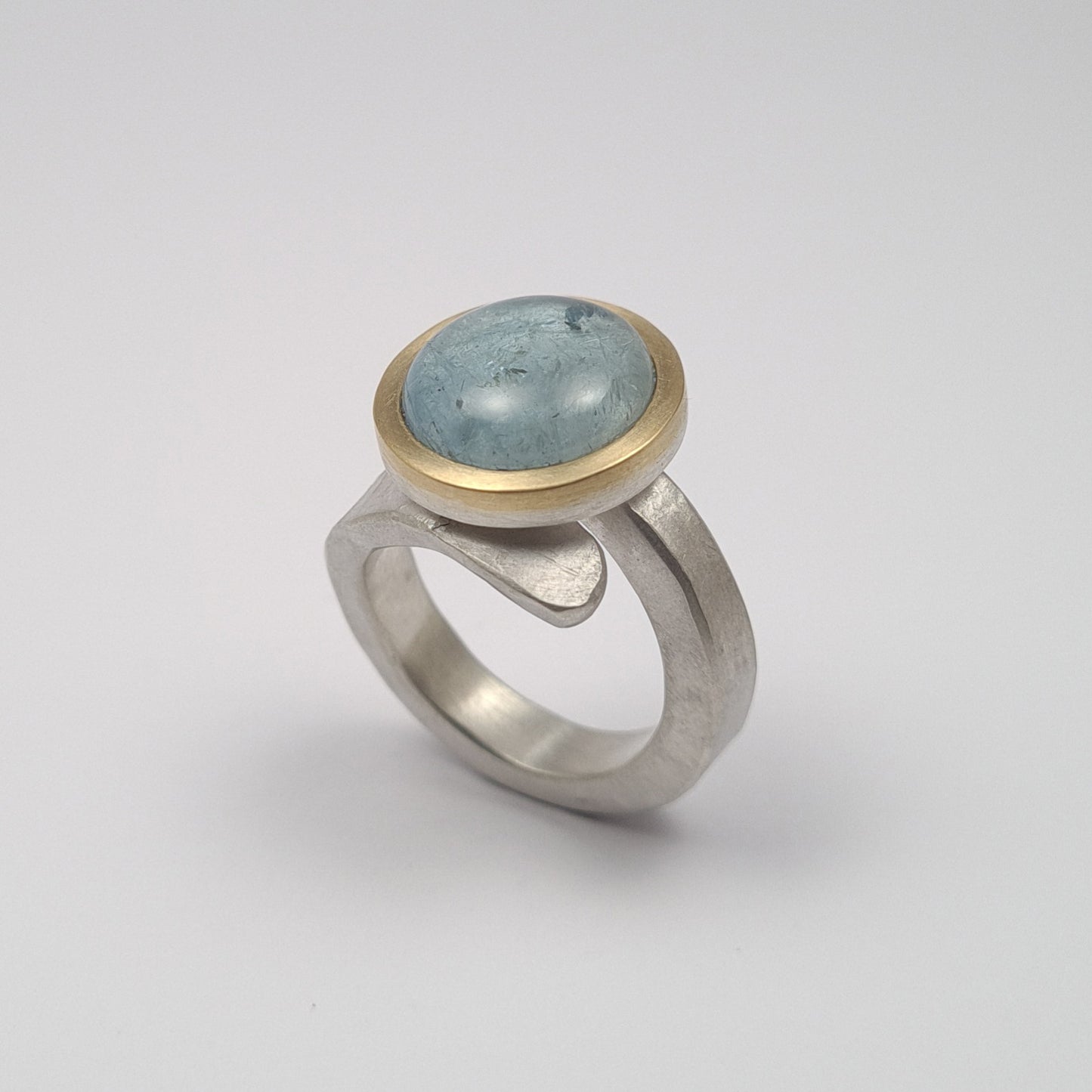 ForJa ring crossed with aquamarine. YES