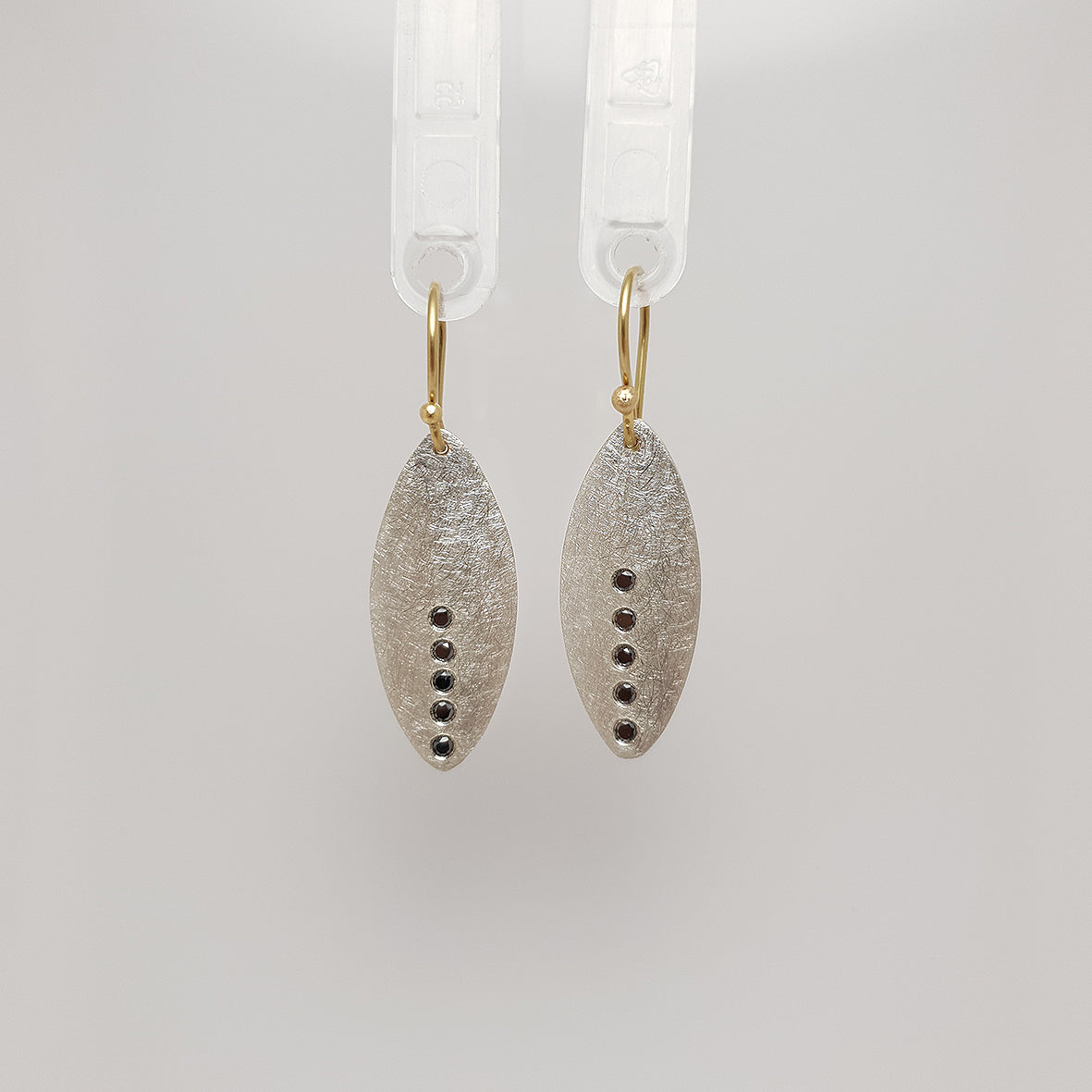 dallÀ collection earrings