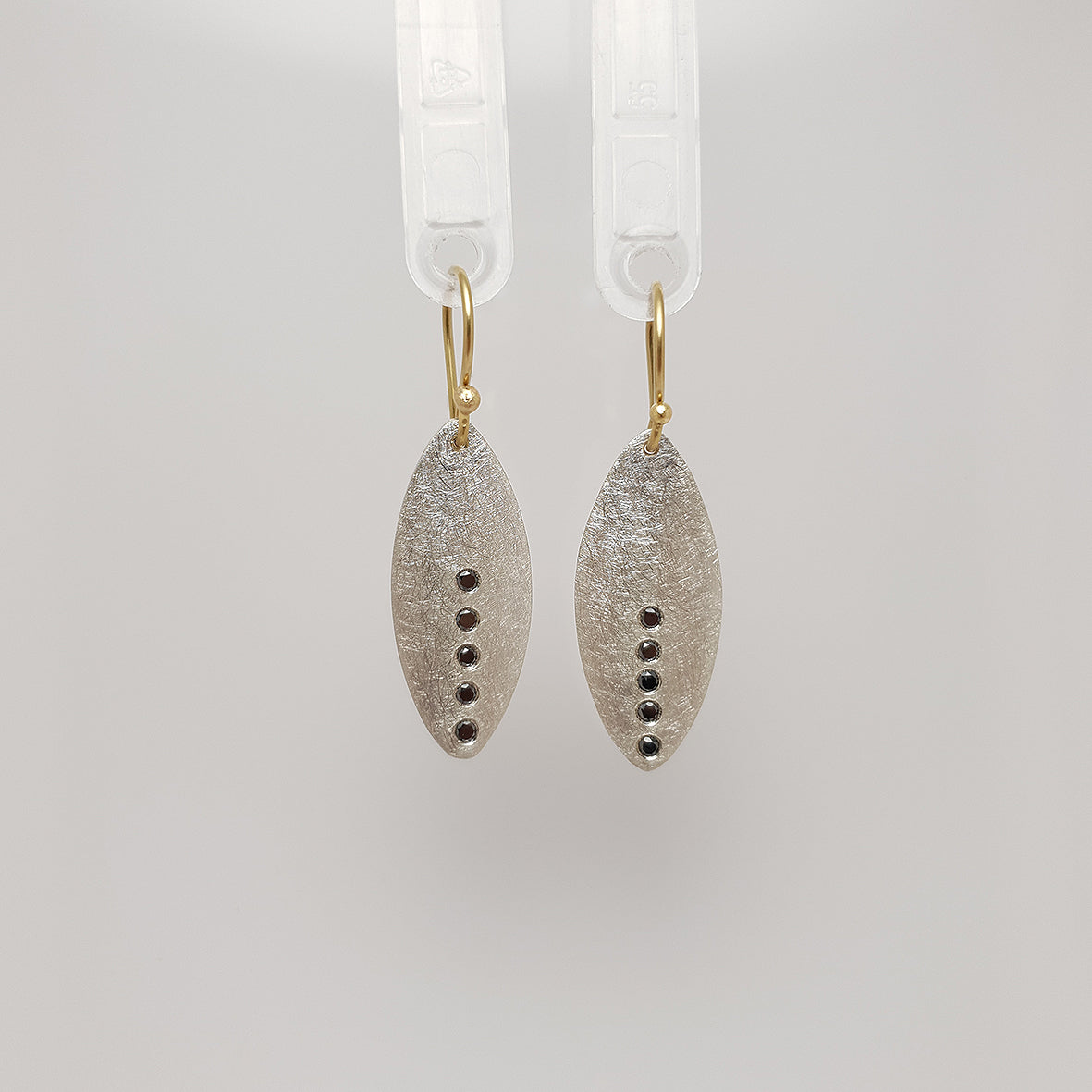 dallÀ collection earrings