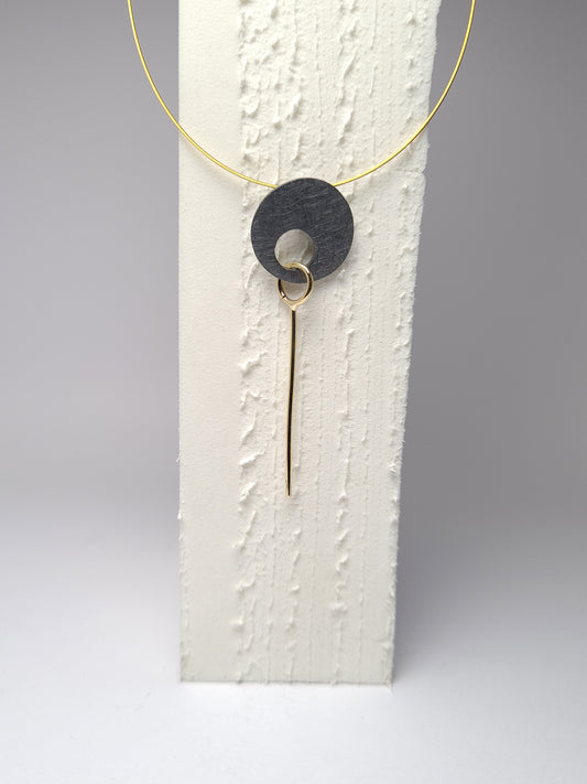 Round gold pendant from the fiLs collection