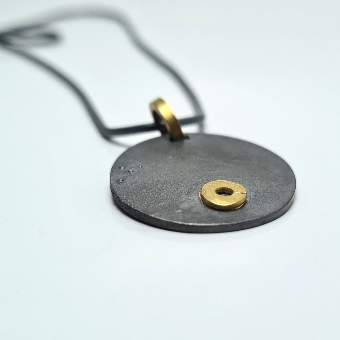 Pendant O of the imProvisada collection